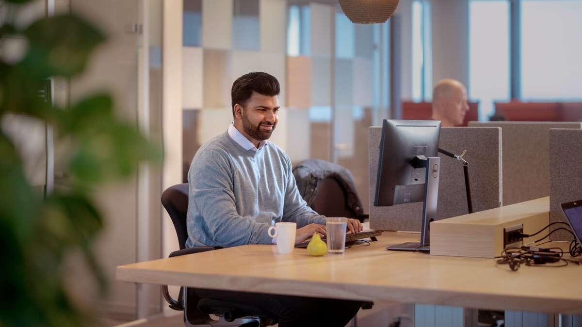 Man working on a computer at the office