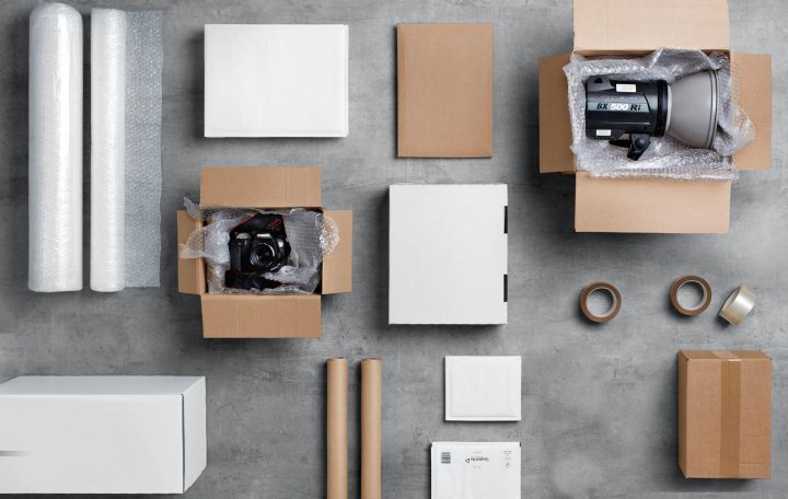 Parcels with various content and packaging lying on a table